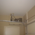 compressor-mounted-on-shelf-in-garage