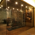 glass-wine-room-with-divider-rack