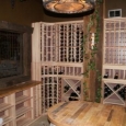 Custom Wine Cellar with wine barrel tabletops