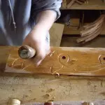 Detail being carved carved by our staff - Custom Wine Cellars Washington