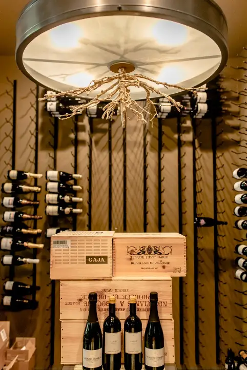 Elegant Floor to Ceiling Wine Racks Installed by Master Builders of Custom Commercial Wine Cellars
