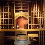Arch focal point. Wine barrel table with glass top.