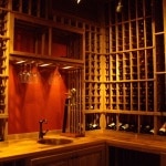 Left corner with glass rack, sink, and reclaimed Cooperage wine barrel counter tops 