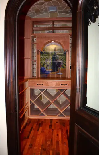 Doorway of Wine Room Showing Wine Barrel Flooring and Wood Racking