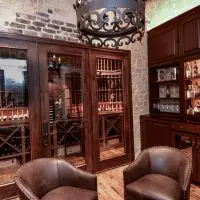 A look into the entertaining and storage areas of this wine cellar. An area like this will charm potential buyers, increasing the resale value of your home.