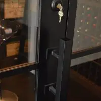 The wine cellar is locked behind a custom iron door, which can only be opened with a key.