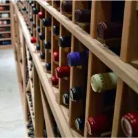 Unfinished Wine Racks Produce Clean Design for This Custom Traditional Cellar