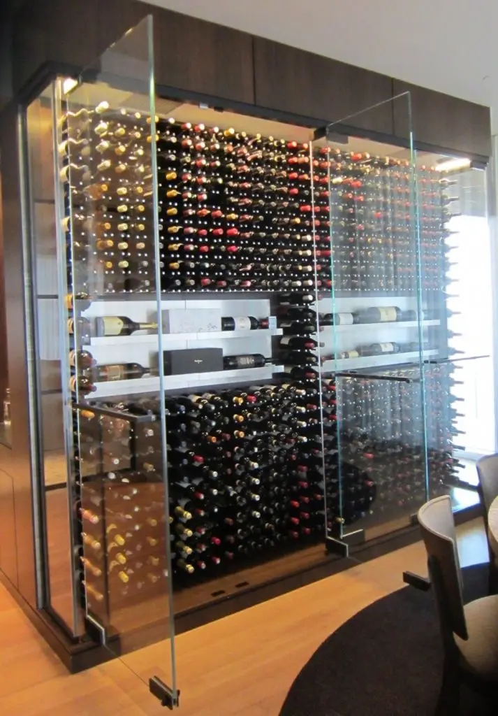 Modern Wine Cellar Design Installed with Metal Wine Racks by Dallas Builders