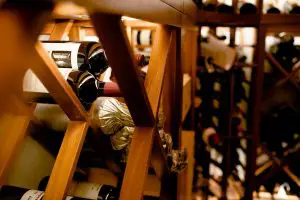 North Dallas Residential Wine Room Features Mahogany Wooden Wine Rack