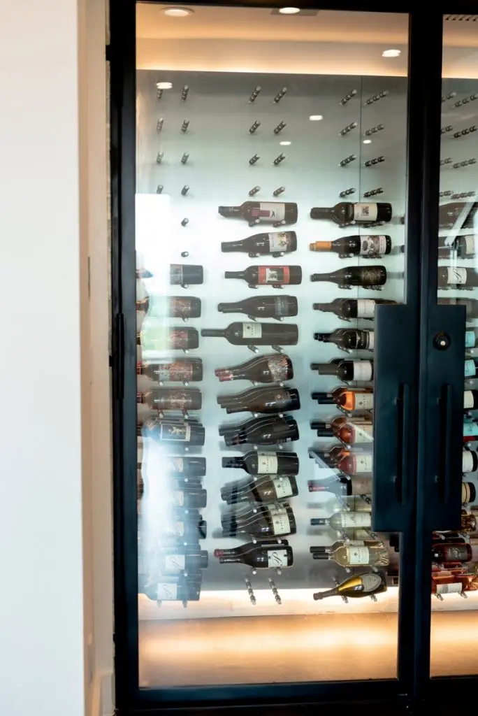 Contemporary Glass Wine Cellar Closet Built in a Condo in Downtown, Dallas