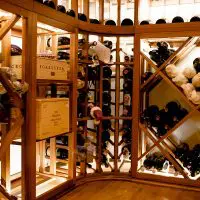 Wooden wine racking with diamond bins,