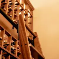 This rolling ladder makes it easier to reach wines stored in high places.