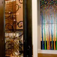 The proper door is an essential part of a wine cellar.