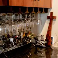Enjoy your wines with friends with this wine cellar bar area.