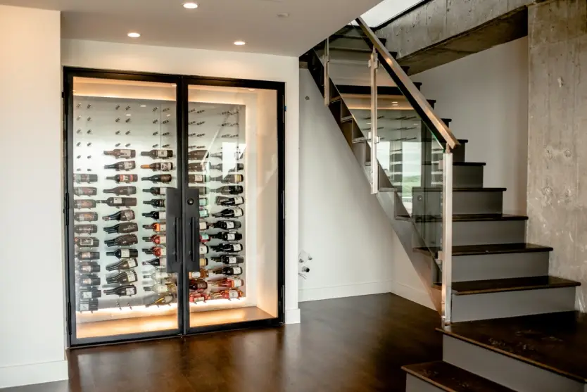 Wine Cellar Lighting in a Contemporary Custom Wine Closet in Dallas