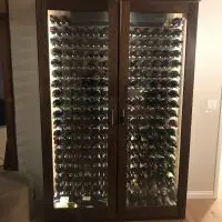 Here is a great example of an affordable, beautiful, and practical wine cabinet.