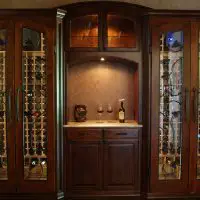 This homeowner wanted a tasting nook and arch in between two cork-forward racks.