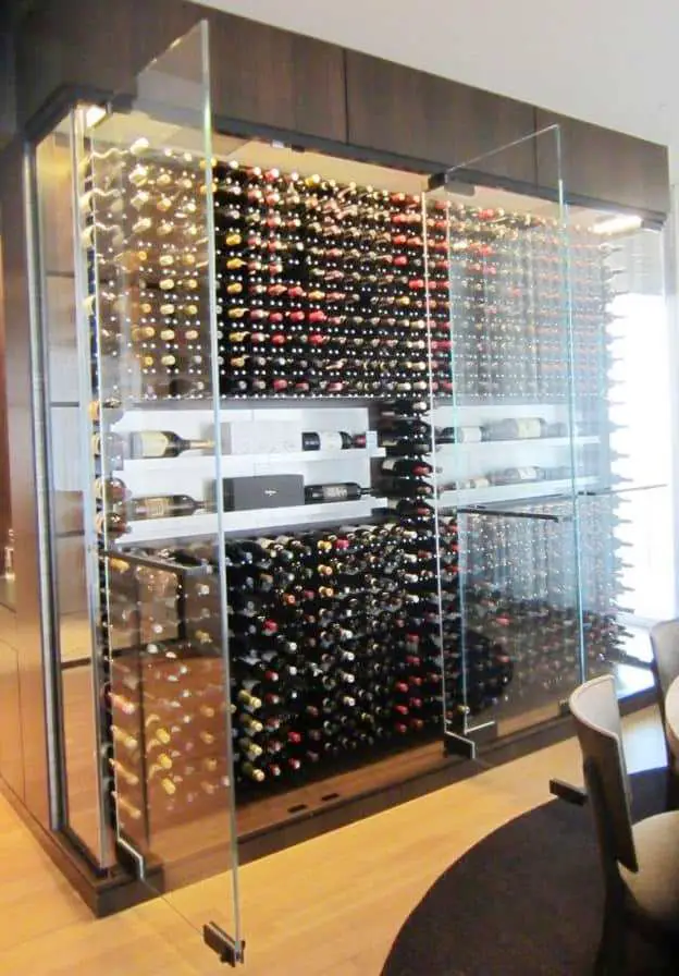 Award-Winning Modern Home Wine Cellar with Glass Doors by Dallas Builders