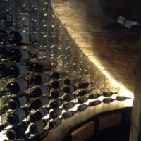 Ribbon lighting behind the case storage shines up through the VintageView racking from below