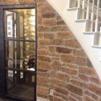Stone Coat to the Interior and Exterior Walls - Wine Cellar Design Coppell Texas