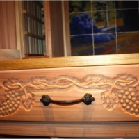 25. Residential Wine Cellar Custom Drawers with Decorative Woodwork