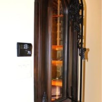 6. Wine Cellar Door with Operable Iron in Colleyville, Texas