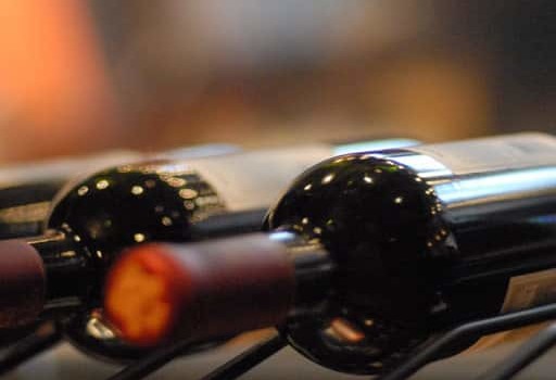 Bottles cradled in presentation rack.