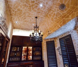 The chandelier is a central piece of this room, making the room appear more luxurious. Its the details, like this wine cellar, that really add value to a home. Its the details, like this wine cellar, that really add value to a home.