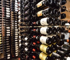 A Custom Commercial Wine Cellar Needs Quality Wine Racks. Jasper's Restaurant at Cityline in Richardson Texas Chose Wall Mounted Racks and Floor to Ceiling Racks, Keeping Their Wine Safe and Accesible