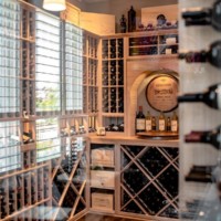 Beautiful glass reflection outside the wine cellar room.