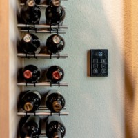 Easier to reach and location wise inside the wine cellar area.