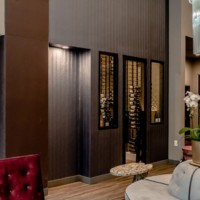 A view from the outside of the small wine room.