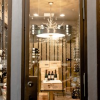 Center-focused view in the commercial wine room.
