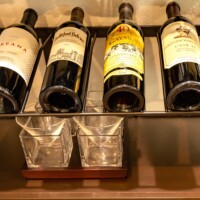 7 - Metal wine racks held the wines for consumption and entertaining